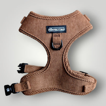 Corduroy dog harness from The Pawfect Trio, pet accessory with adjustable straps and soft texture for comfortable pet walking.