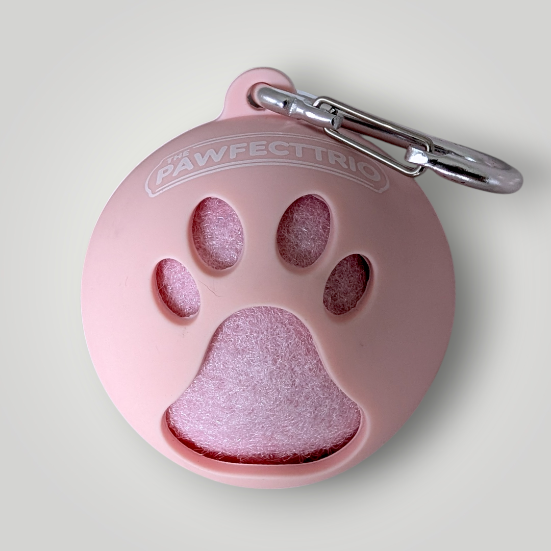 The Pawfect Trio tennis ball holder pet toy with a colorful design and secure clip for storing tennis balls for dogs.