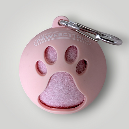 The Pawfect Trio tennis ball holder pet toy with a colorful design and secure clip for storing tennis balls for dogs.