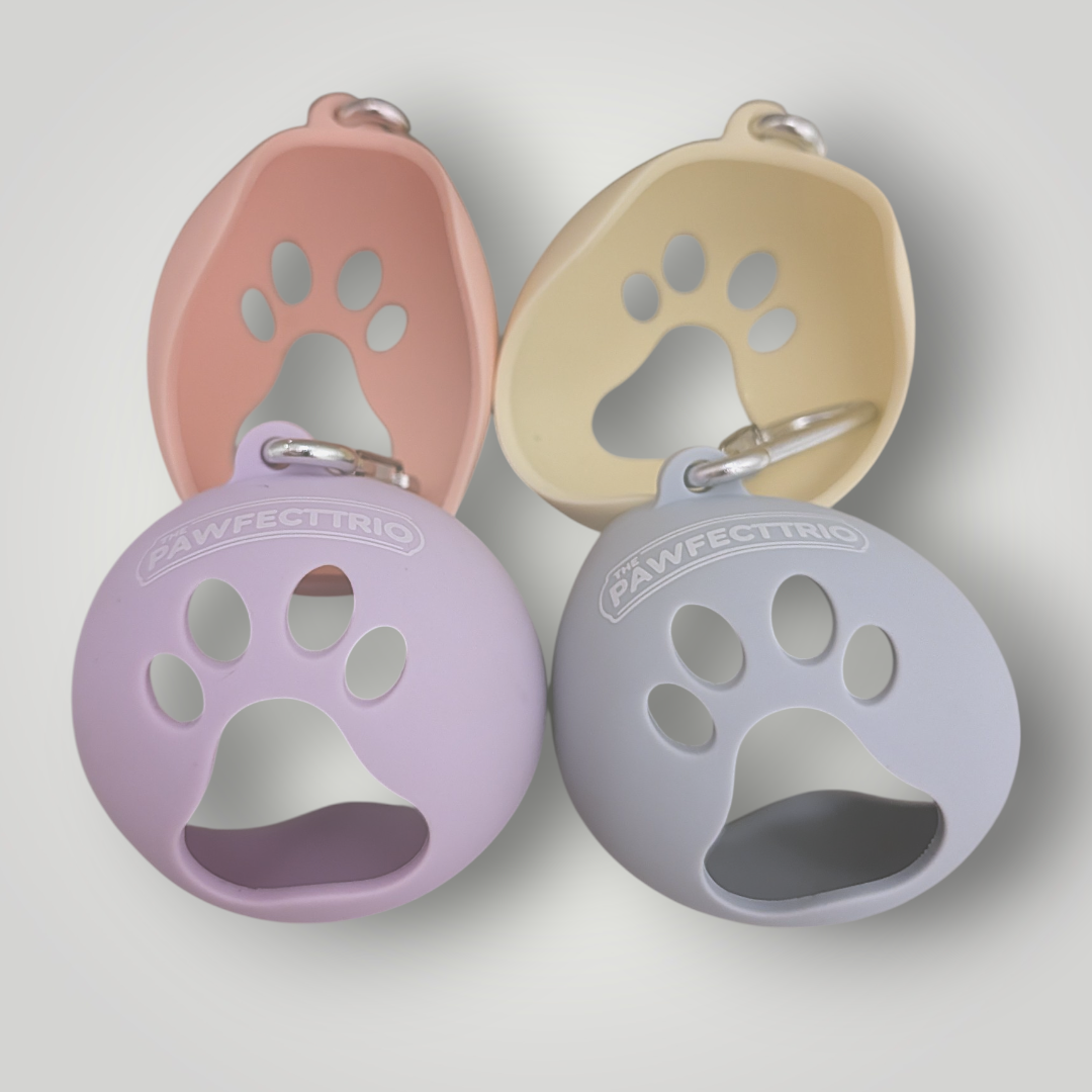 The Pawfect Trio tennis ball holder pet toy with a bright, durable design featuring a tennis ball for dogs to fetch and carry.