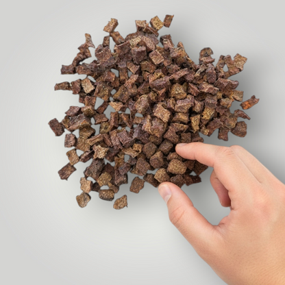 Treat Treat Kangaroo Training Bites dog treats, small and chewy for training, shown in a resealable bag with treats inside.
