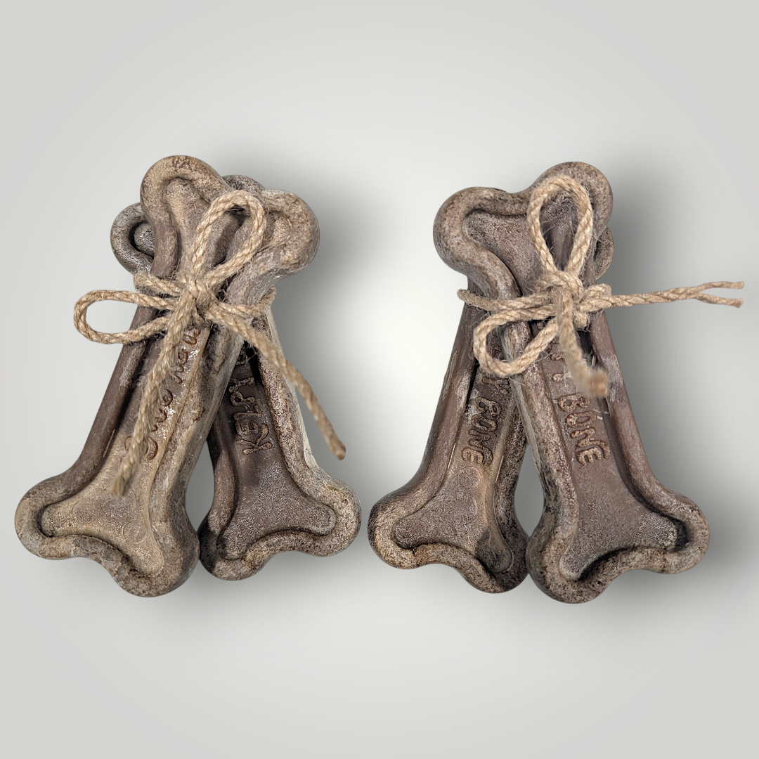 Kelpy Bone dog toy made of durable material, featuring a playful design for chewing and fetching.