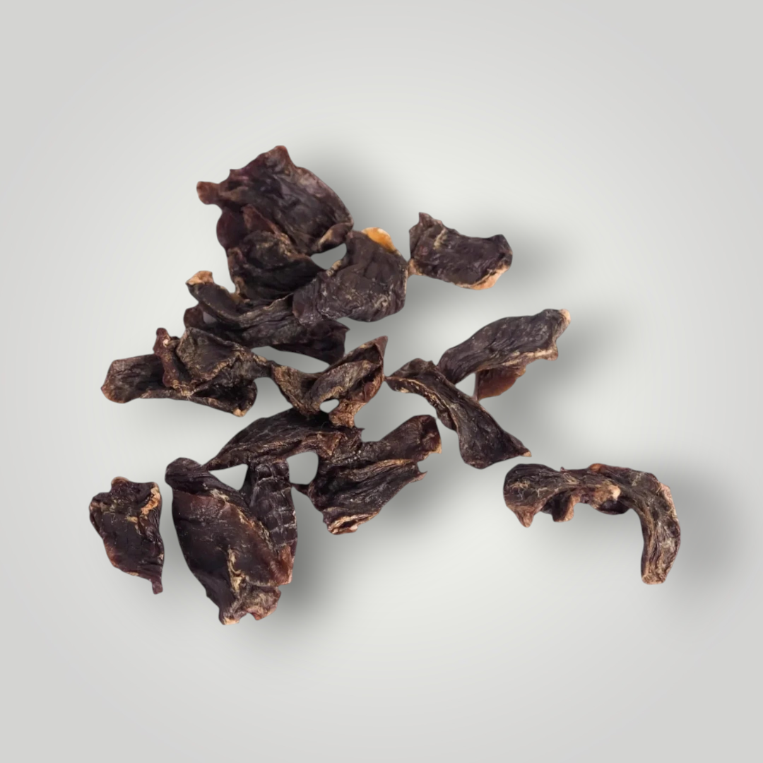 Treat Treat duck heart dog treats, showing raw duck heart pieces on a white background, ideal for dogs' healthy snack options.