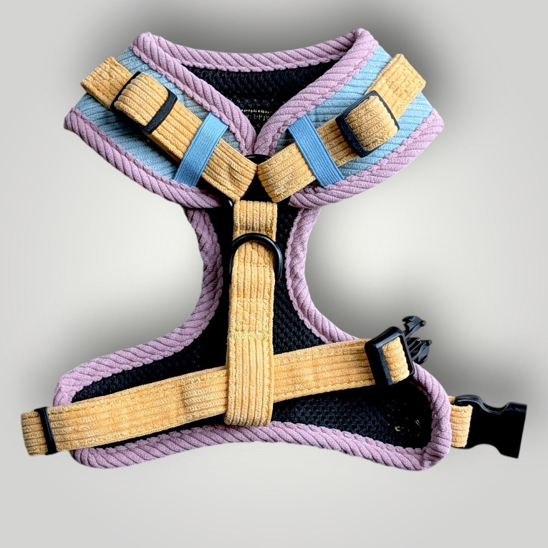 Pink corduroy dog harness by The Pawfect Trio, comfortable pet accessory with adjustable straps for small to medium dogs.