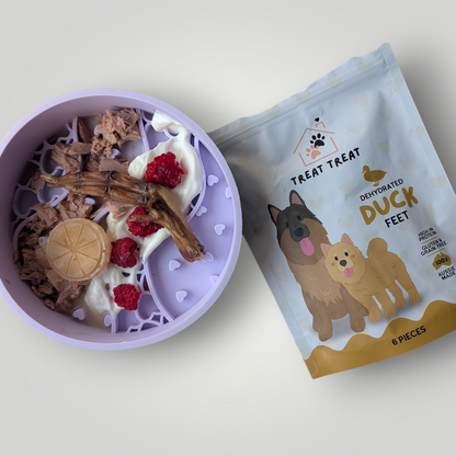 Treat Treat Duck Feet dog treats with natural dried duck feet shown on a neutral background.