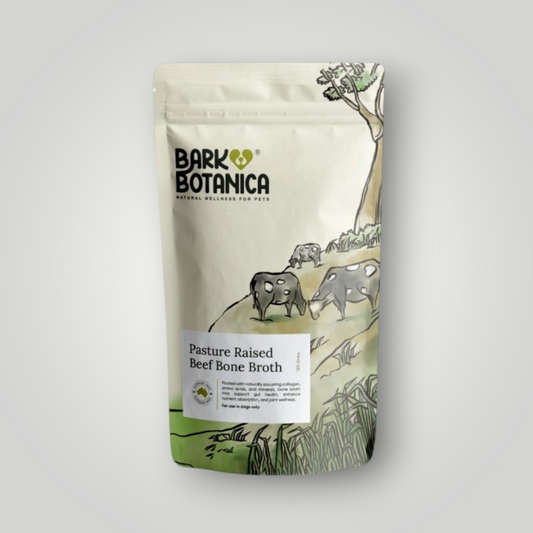 Bark Botanica grass-fed beef bone broth powder for pet wellness, shown in a resealable bag with natural ingredients.