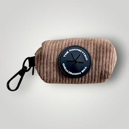 Corduroy dog poop pouch by The Pawfect Trio, featuring a compact, stylish design for easy waste disposal during walks.