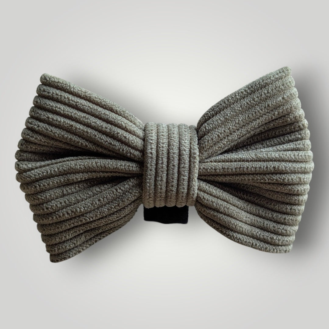 Dog bow tie from The Pawfect Trio, a stylish pet accessory with a classic design for dogs.