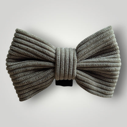 Dog bow tie from The Pawfect Trio, a stylish pet accessory with a classic design for dogs.