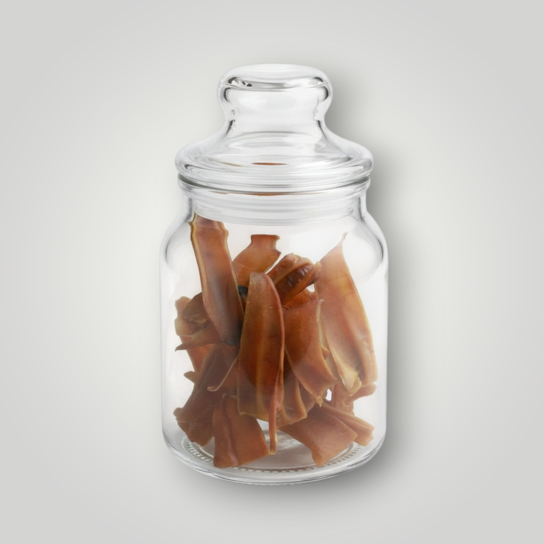 Treat Treat pig ear strips dog treats, showing crispy, natural pig ear treats for dogs with textured surface and golden-brown color.