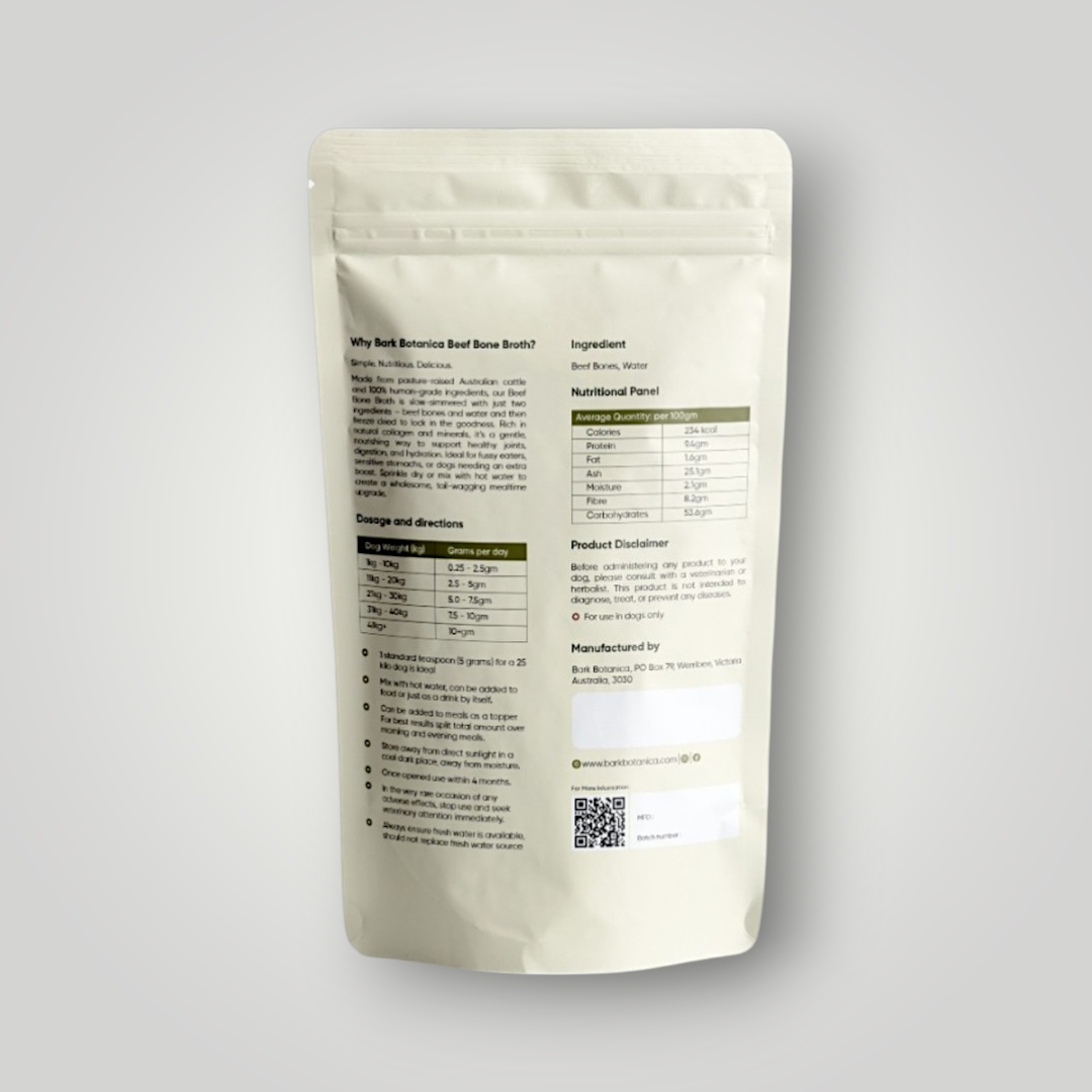 Bark Botanica Beef Bone Broth Powder for pets, grass-fed beef flavor, in a resealable bag with powder inside.