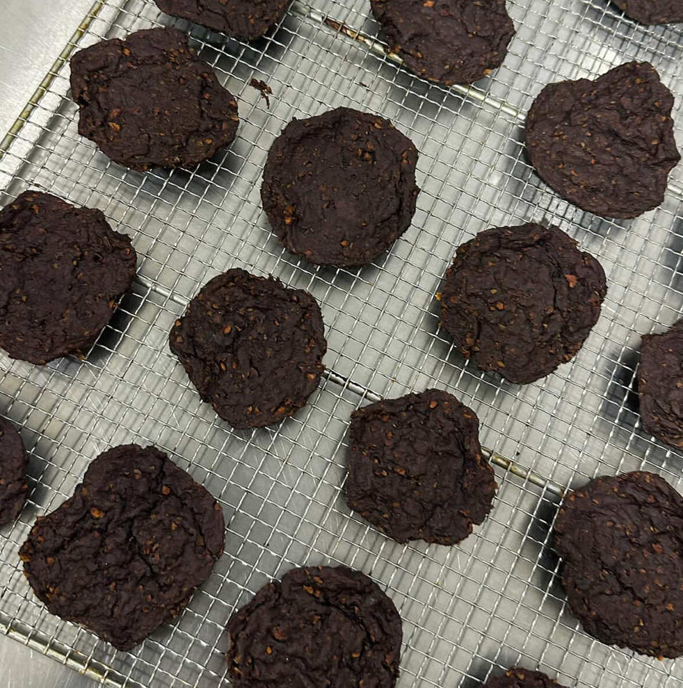 Dog treats from The Pawfect Trio Easter Bites, limited edition Easter-themed dog treats in colorful packaging.