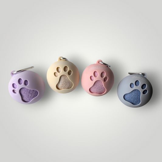 The Pawfect Trio tennis ball holder for pets, featuring a colorful design with a tennis ball inside, made of durable pet toy material.
