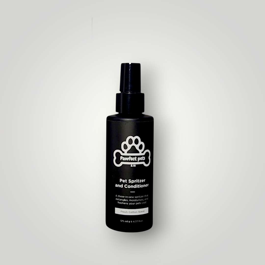 Dog conditioning spray from Pawfect Pets & Co, a pet wash product, shown in a clear spray bottle with a nozzle and label.
