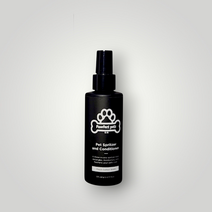 Dog conditioning spray from Pawfect Pets & Co, a pet wash product, shown in a clear spray bottle with a nozzle and label.