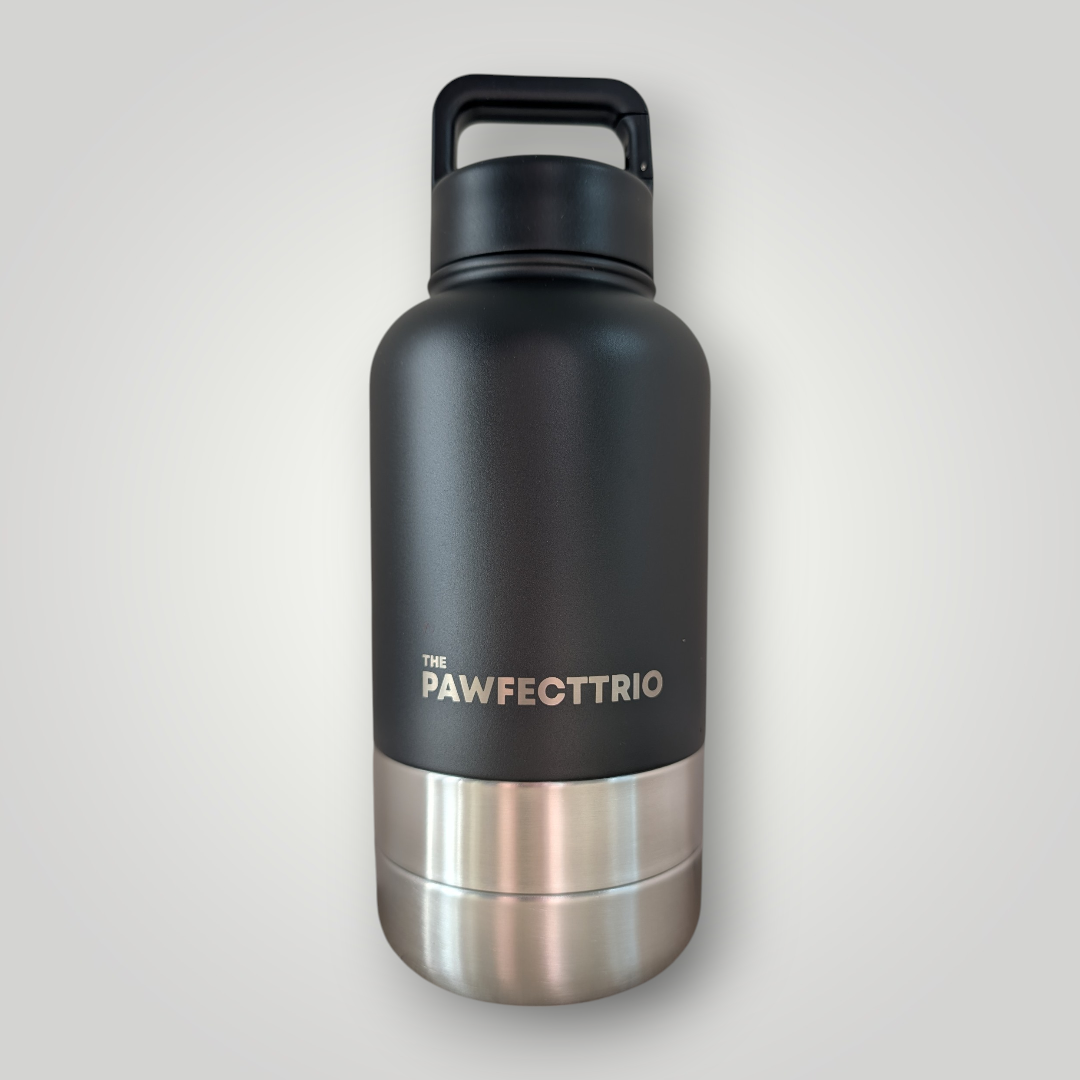 Pet adventure bottle from The Pawfect Trio featuring a compact, portable water container with a built-in bowl for pets.