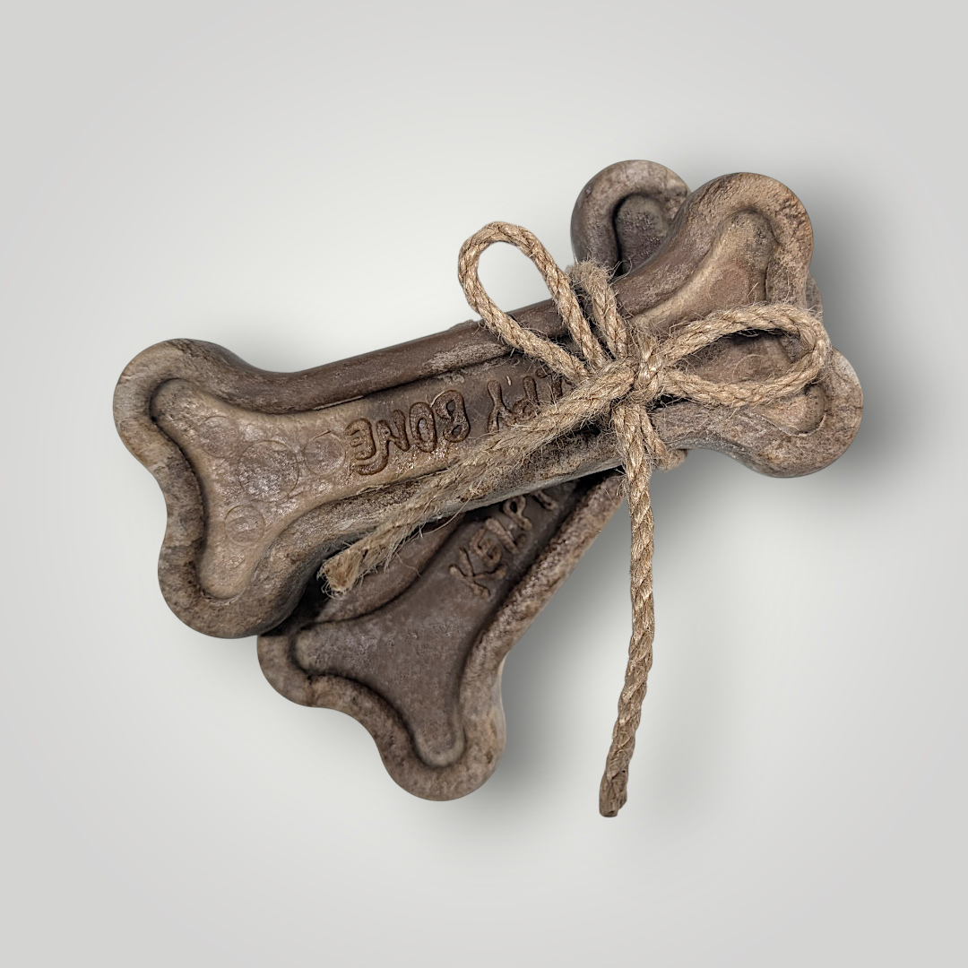 Kelpy Bone dog toy made of durable material, designed for chewing and play, featuring a colorful, textured surface.