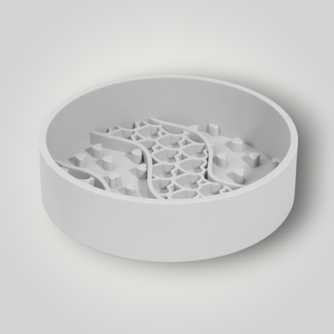 The Pawfect Trio slow feeder dog bowl with raised ridges to help dogs eat slowly and prevent choking or indigestion.