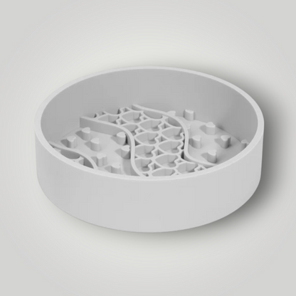 The Pawfect Trio slow feeder dog bowl with raised ridges to help dogs eat slowly and prevent choking or indigestion.