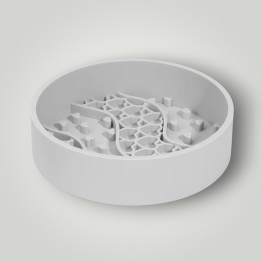The Pawfect Trio slow feeder dog bowl with raised ridges to help dogs eat slowly and prevent choking or indigestion.