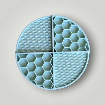 Slow Feeders dog mat by The Pawfect Trio with raised ridges designed to slow down dogs during mealtime.